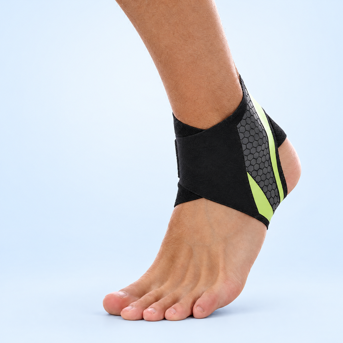 Adjustable Lycra ankle support brace, black and green